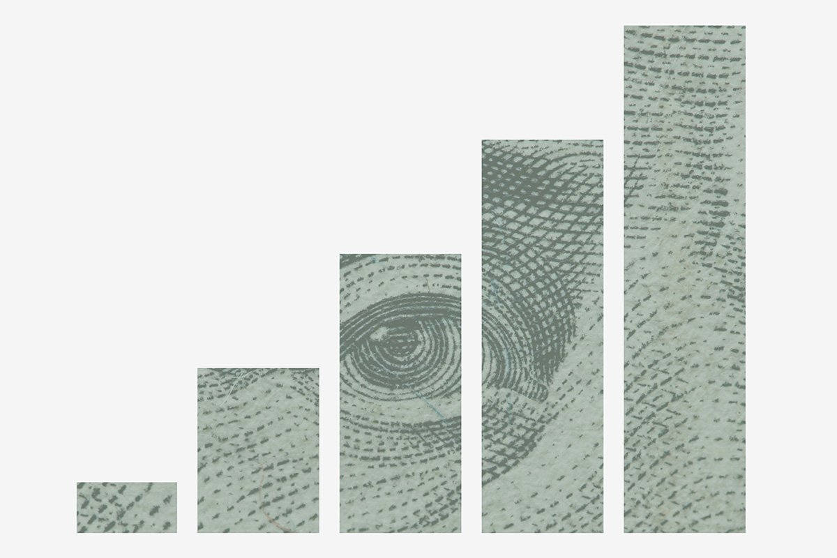 A rising bar chart where the bars are patterned with dollar bill print, representing the way enterprise capital allows nonprofits to plan, build, and grow.